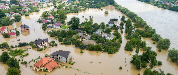 Aerial view of flooded houses with dirty water of Dnister river in Ukraine.