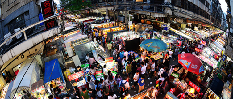 Crowds of people on a Wuhan street in a retail area