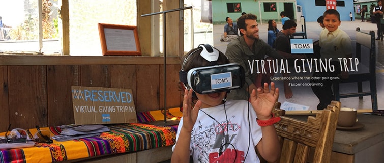 child using virtual reality goggles