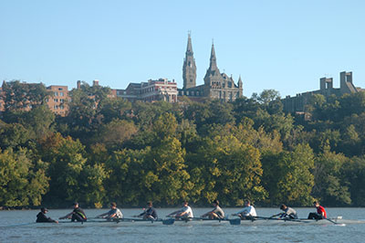 Rowing team on Potomoac river with Georgetown in background